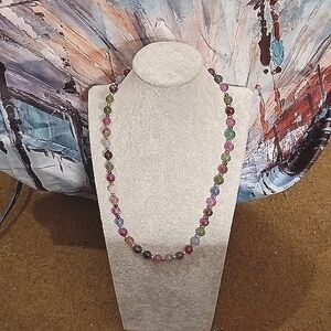 Hand Designed beaded multi colored necklace with a 20 inch chain.